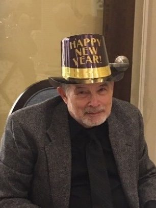 Man in black New Years Hat