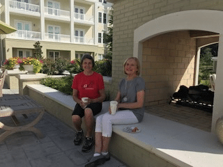 2 ladies sitting in front of South Bay